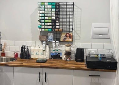 Smart Hair Studio's sleek countertop with hair products in Terang, Victoria, AU.
