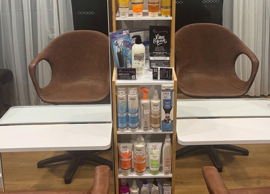 Modern salon chair and product display at Smart Hair Studio, Terang, Victoria, AU.