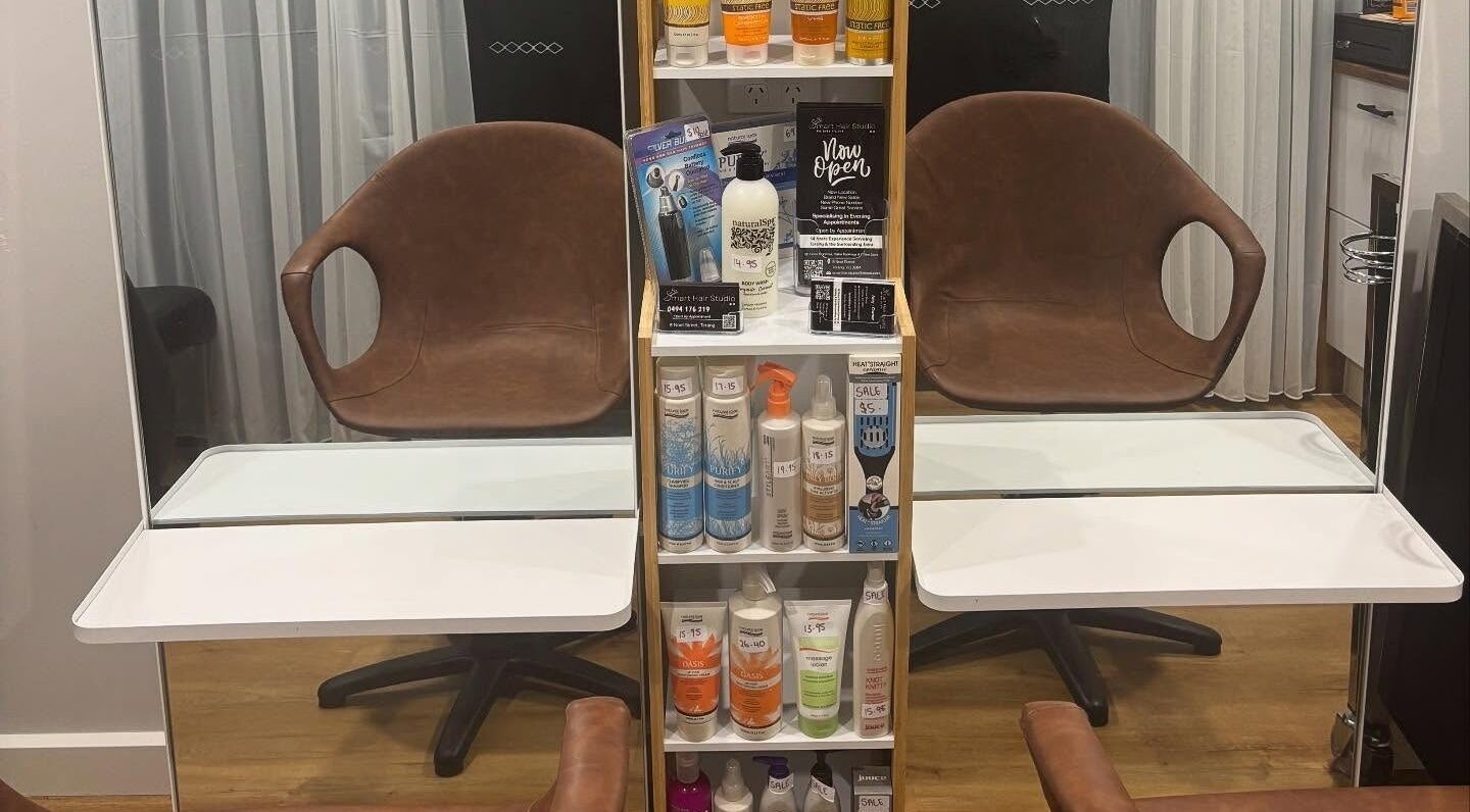 Modern salon chair and product display at Smart Hair Studio, Terang, Victoria, AU.