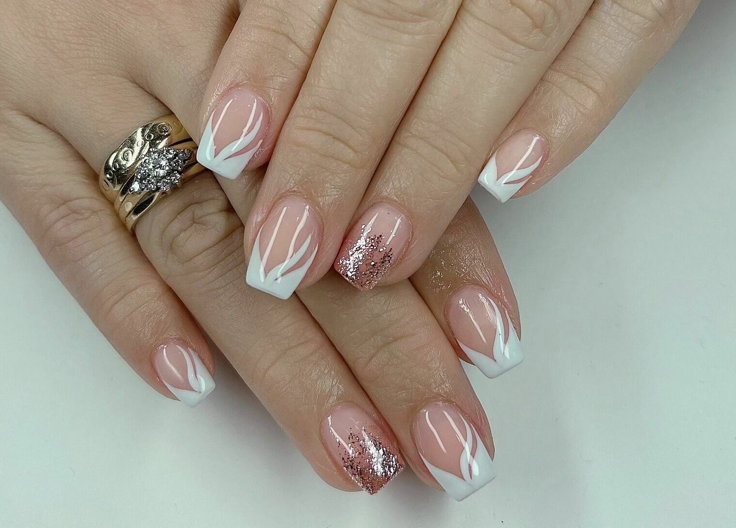 Elegant nail art at MLux Spa & Nails Lounge in Red Deer, Alberta, CA showcasing intricate designs.