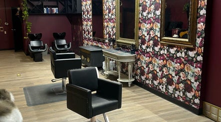 Elegant floral-themed salon interior at Bang-up Beauty, Grande Prairie, Alberta, CA with vintage mirrors.