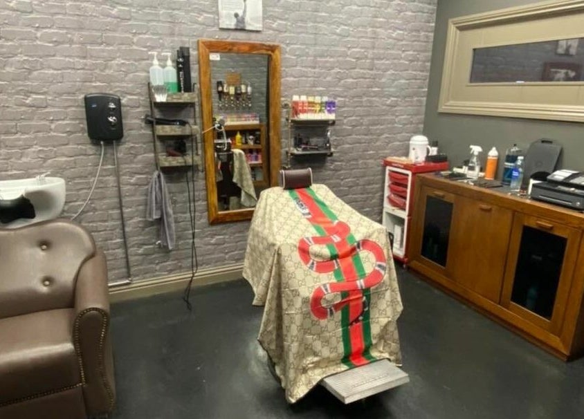Modern styling chair and station at Paul Dawson's Barbers, Stockton-on-Tees, England, GB.