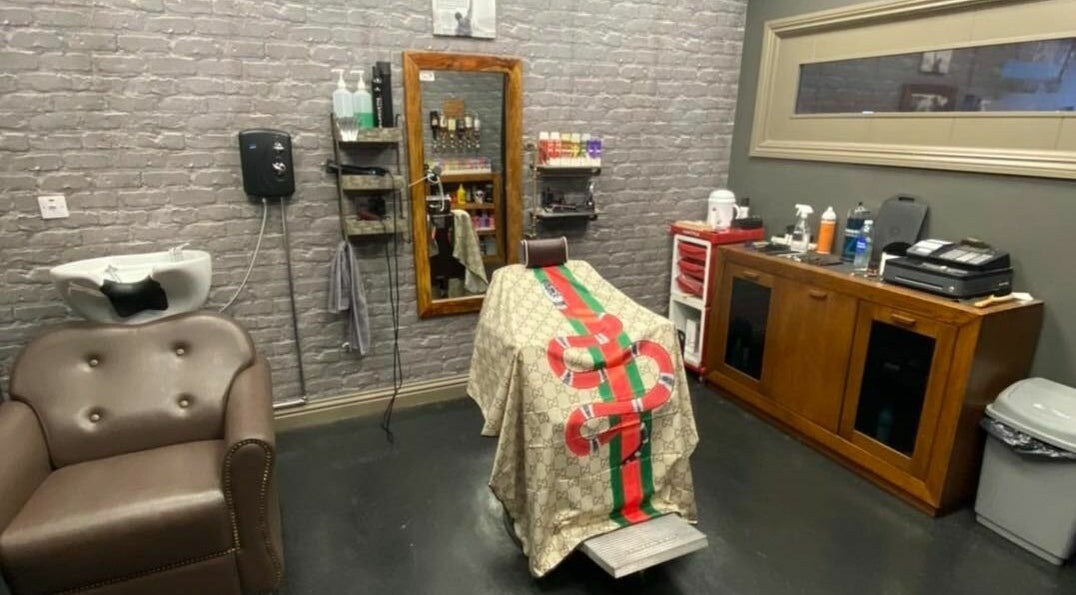 Modern styling chair and station at Paul Dawson's Barbers, Stockton-on-Tees, England, GB.