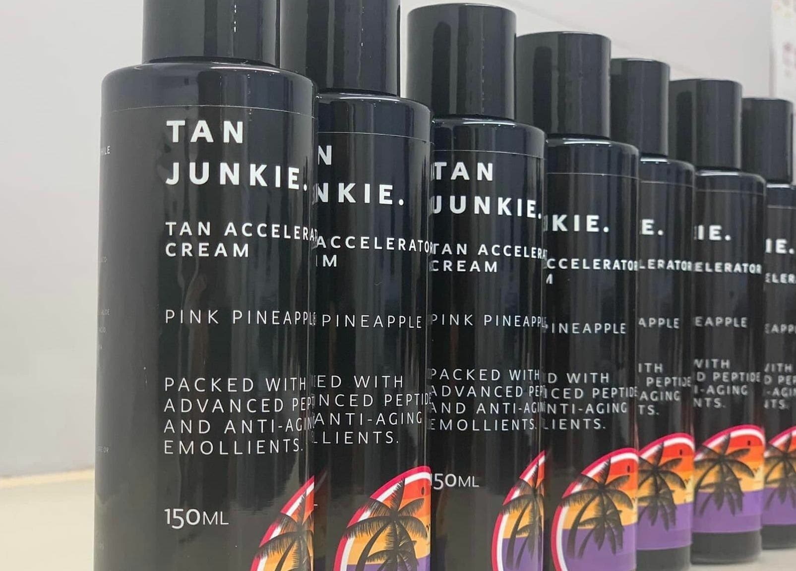 Tan accelerator creams at Paul Dawson's Barbers, Stockton-on-Tees, England, GB, showcasing beauty essentials.