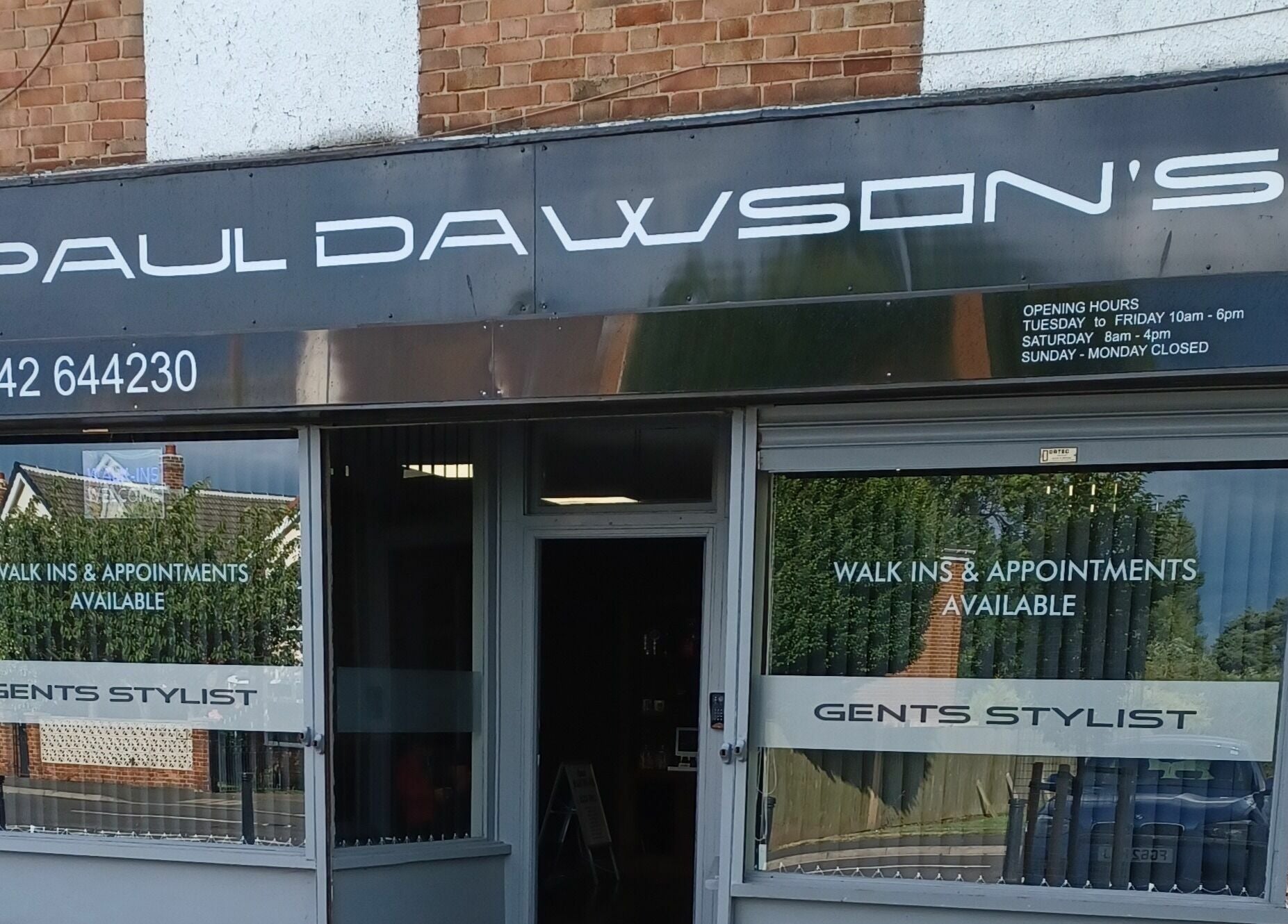 Paul Dawson's Barbers storefront in Stockton-on-Tees, England, GB showcasing stylish barber services.