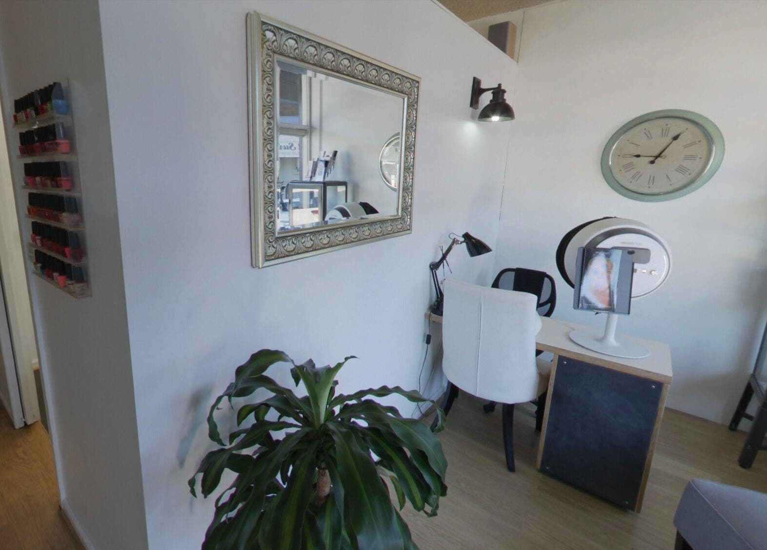 Chic interior of Venus Artistry Brow and Lash Studio in Sydney, New South Wales, AU with a cozy work station.