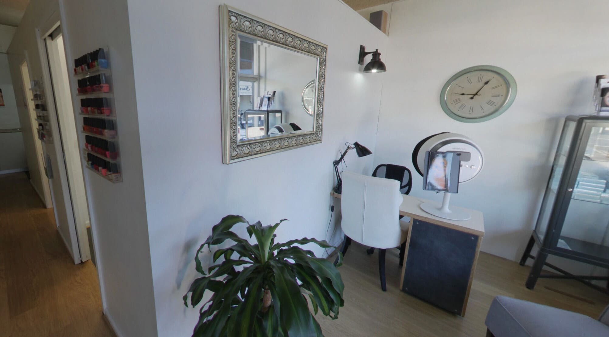 Chic interior of Venus Artistry Brow and Lash Studio in Sydney, New South Wales, AU with a cozy work station.