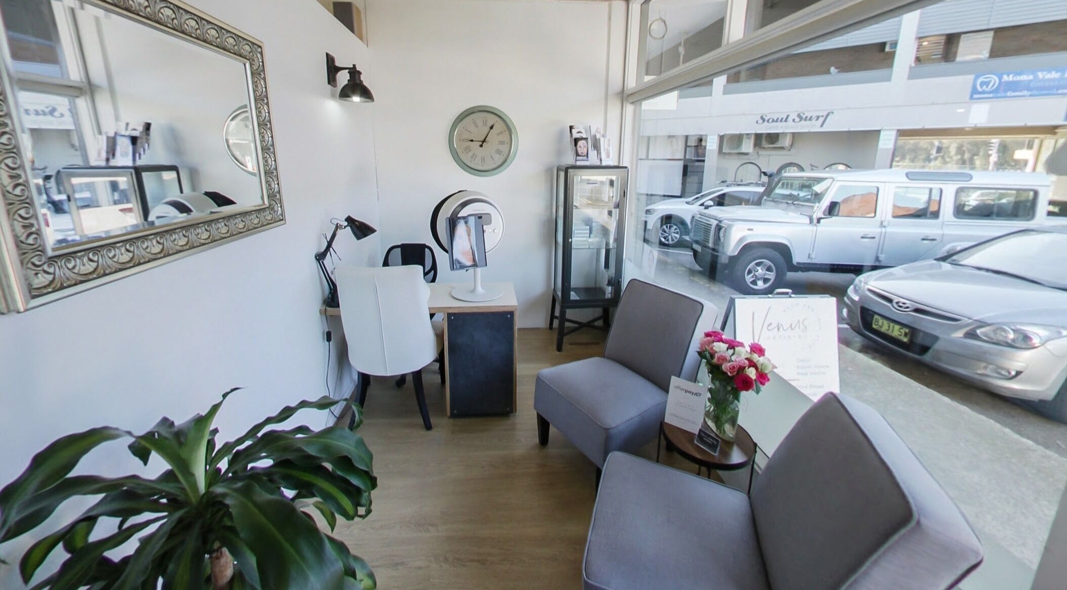 Bright interior of Venus Artistry Brow and Lash Studio in Sydney, New South Wales, AU, showcasing chairs and decor.
