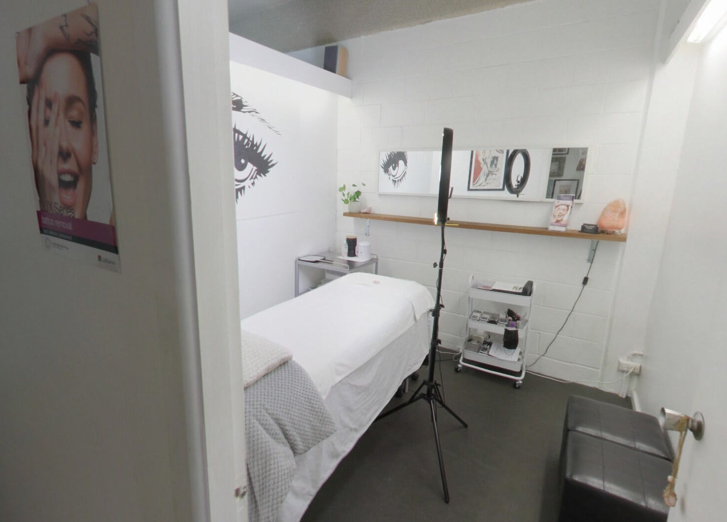 Relaxing treatment room at Venus Artistry Brow and Lash Studio, Sydney, New South Wales, AU, featuring a cozy bed.