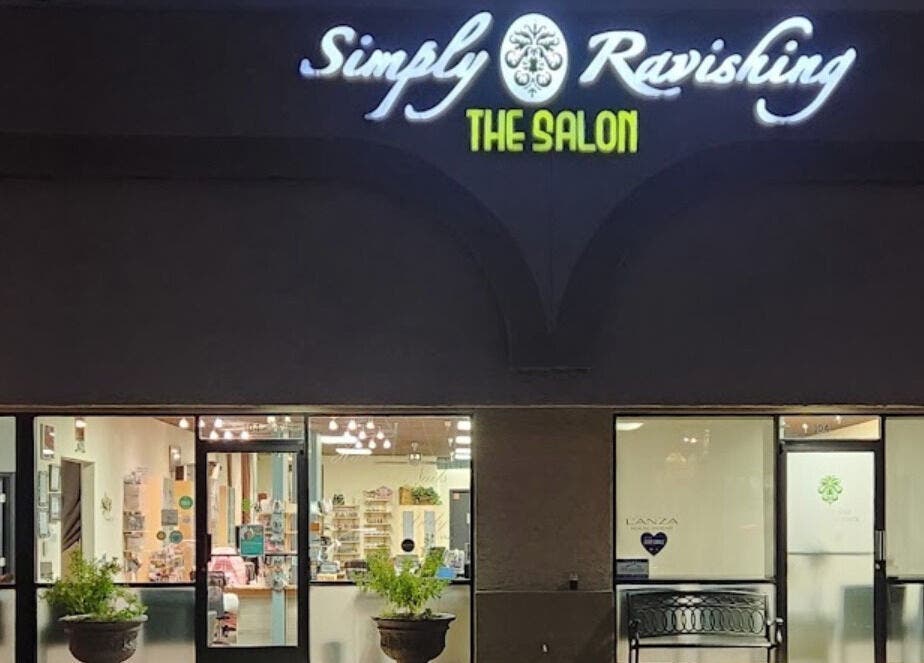 Exterior view of KV Skin Studio (Gilbert) at night showcasing bright signage in Gilbert, Arizona, US.