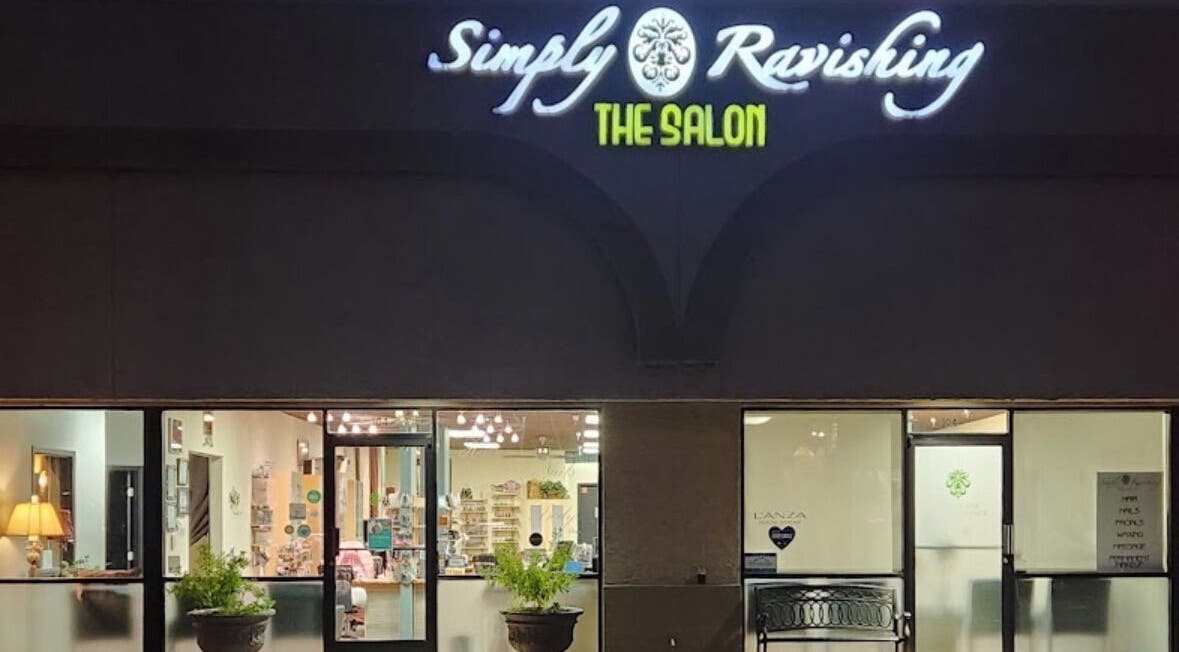 Exterior view of KV Skin Studio (Gilbert) at night showcasing bright signage in Gilbert, Arizona, US.