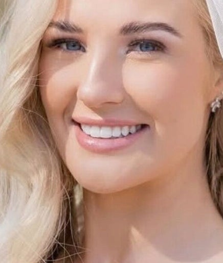 Bride with radiant smile at Mysa Beauty & Training, Godmanchester, England, GB.