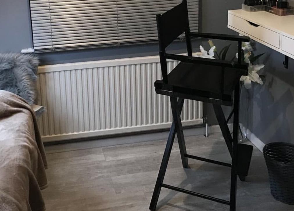 Modern beauty room with stylish chair at By Sophie Louise, Colchester, England, GB; chic and welcoming ambiance.