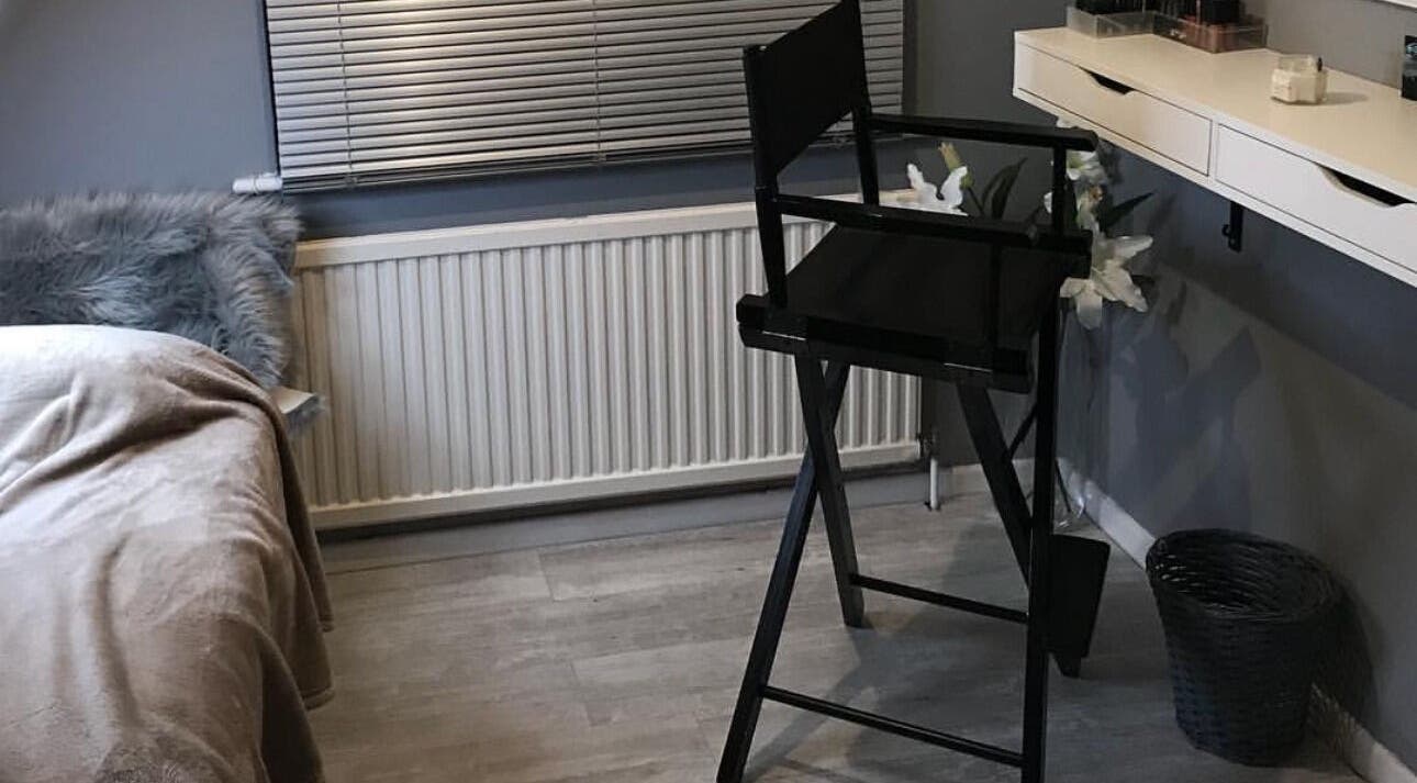 Modern beauty room with stylish chair at By Sophie Louise, Colchester, England, GB; chic and welcoming ambiance.