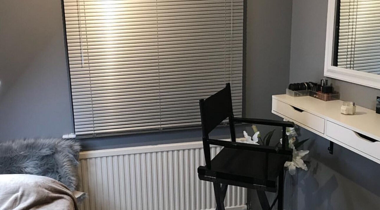 Cozy beauty corner with mirror and chair at By Sophie Louise, Colchester, England, GB.