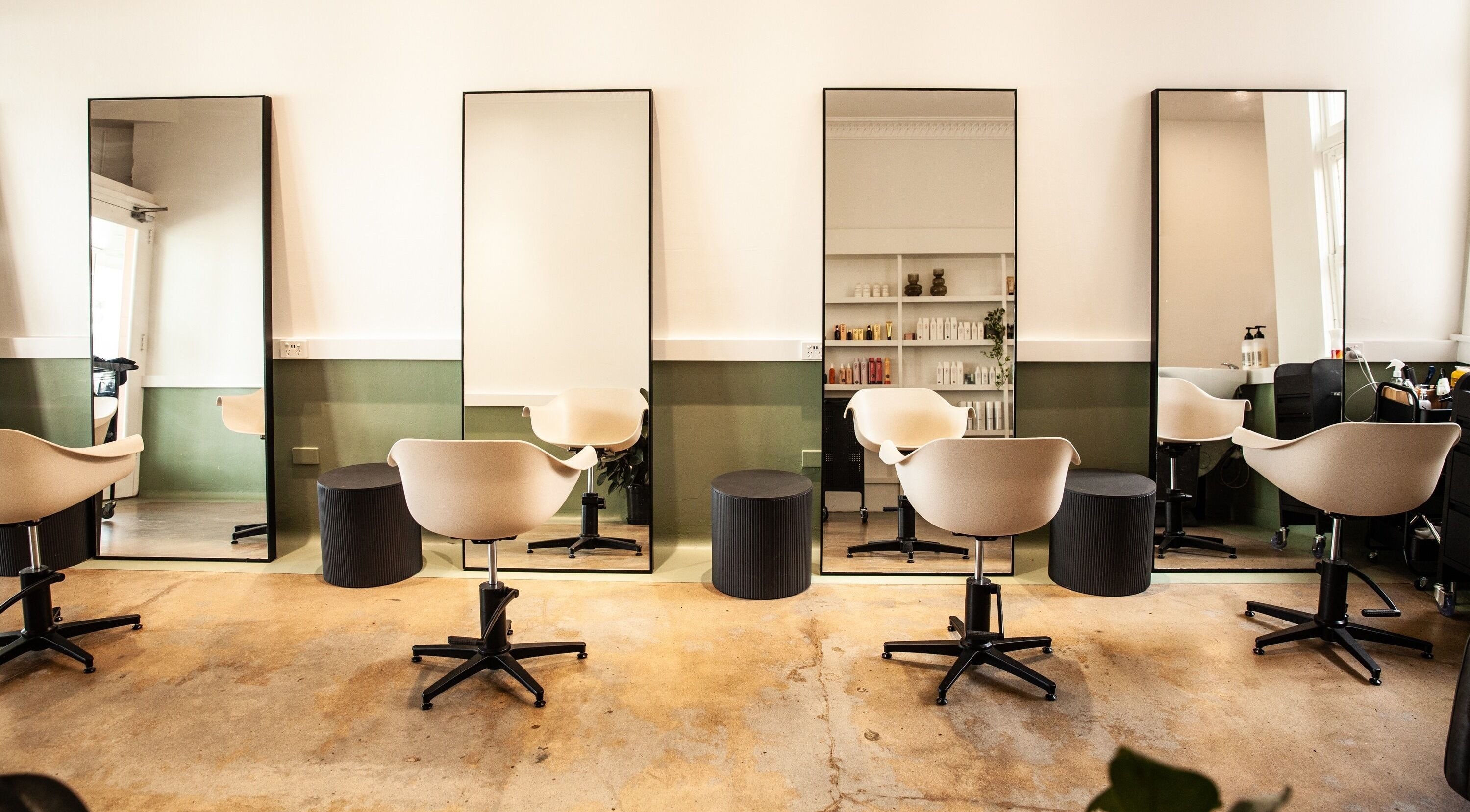 Modern styling chairs and mirrors at Studio T, Windsor, Queensland, AU, showcasing contemporary salon design.