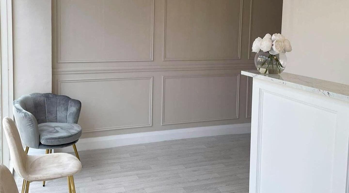 Chic reception area at Allure Beauty | By Ash, Carrick-on-shannon, County Leitrim, IE with plush chairs.