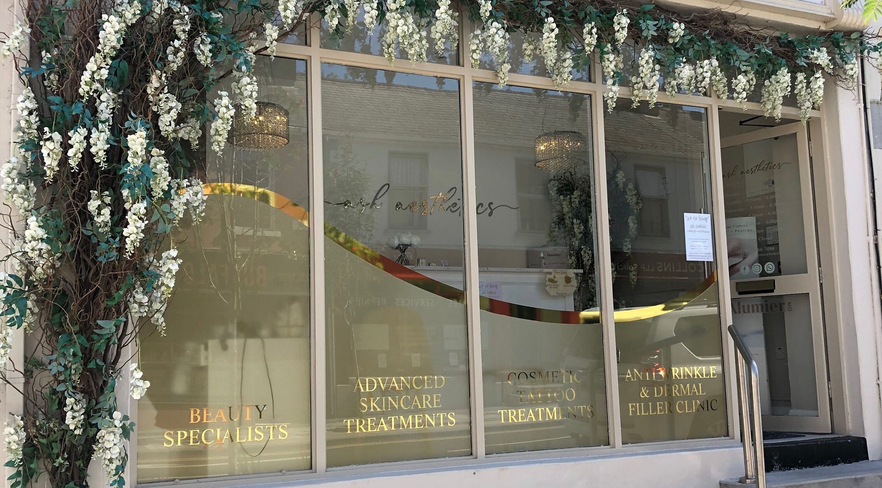 Allure Beauty | By Ash entrance with elegant flowers in Carrick-on-shannon, County Leitrim, IE.