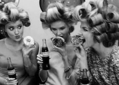 Women with rollers enjoy snacks at B Yo Uty Hair and Beauty Mobile Service, London, England, GB.