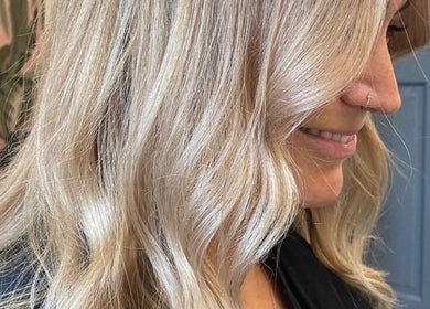 Close-up of styled blonde hair by B Yo Uty Hair and Beauty Mobile Service, London, England, GB.