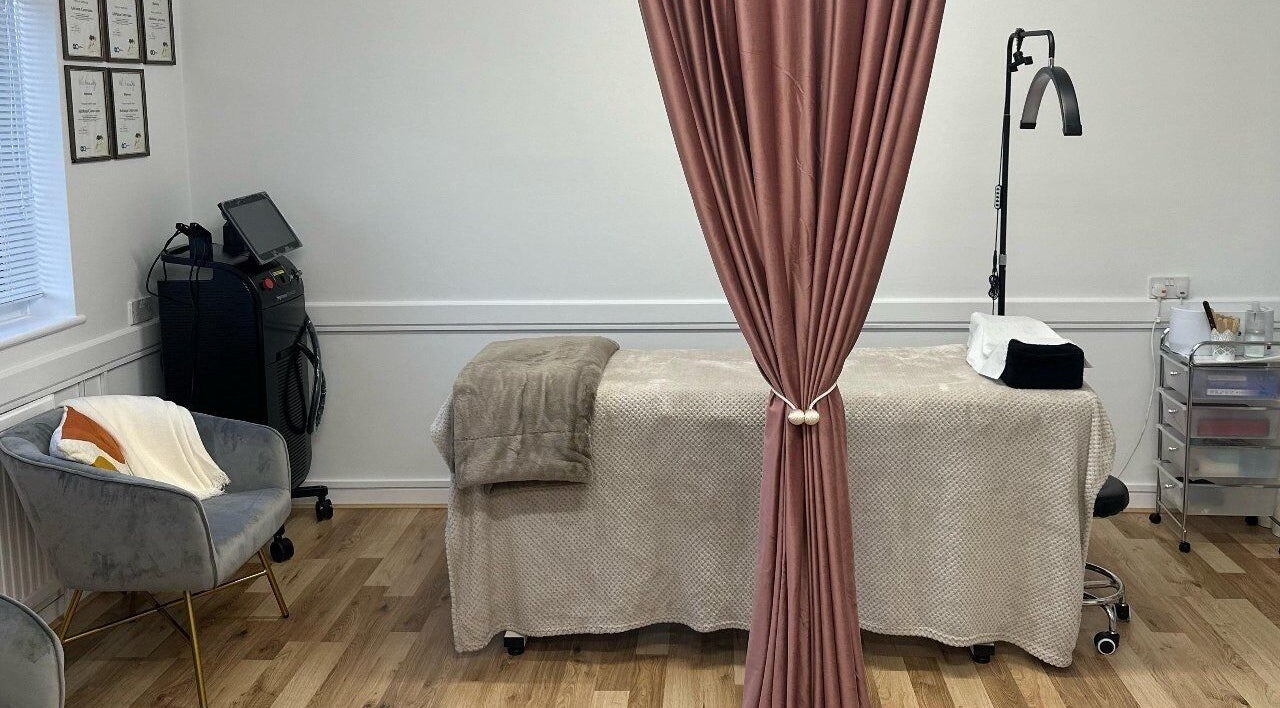 Cozy treatment room at Adriana’s Beauty Parlour, Reading, England, GB with a massage table and elegant decor.