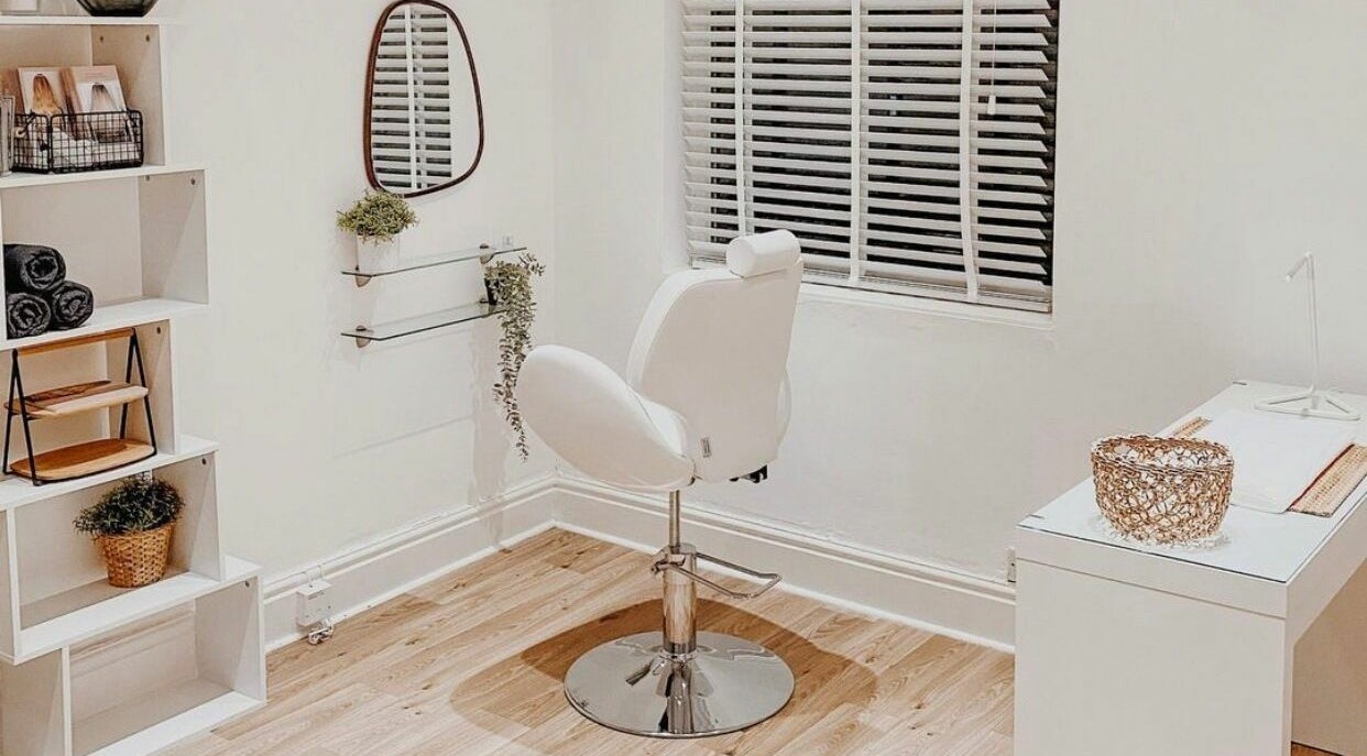 Cozy salon seating at Hair Tech and Co., West Bridgford, England, GB with modern decor and natural light.