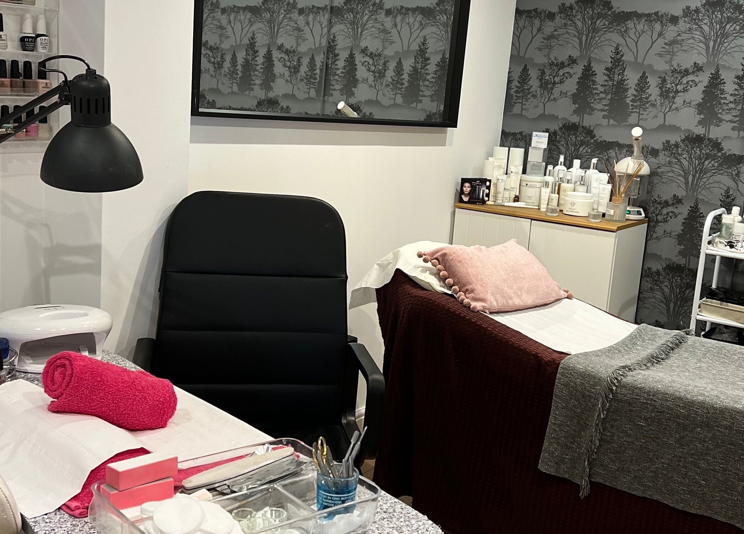 Relaxing treatment room at Archfit Beauty by Rabia Ehsan, Birmingham, England, GB, featuring elegant decor.