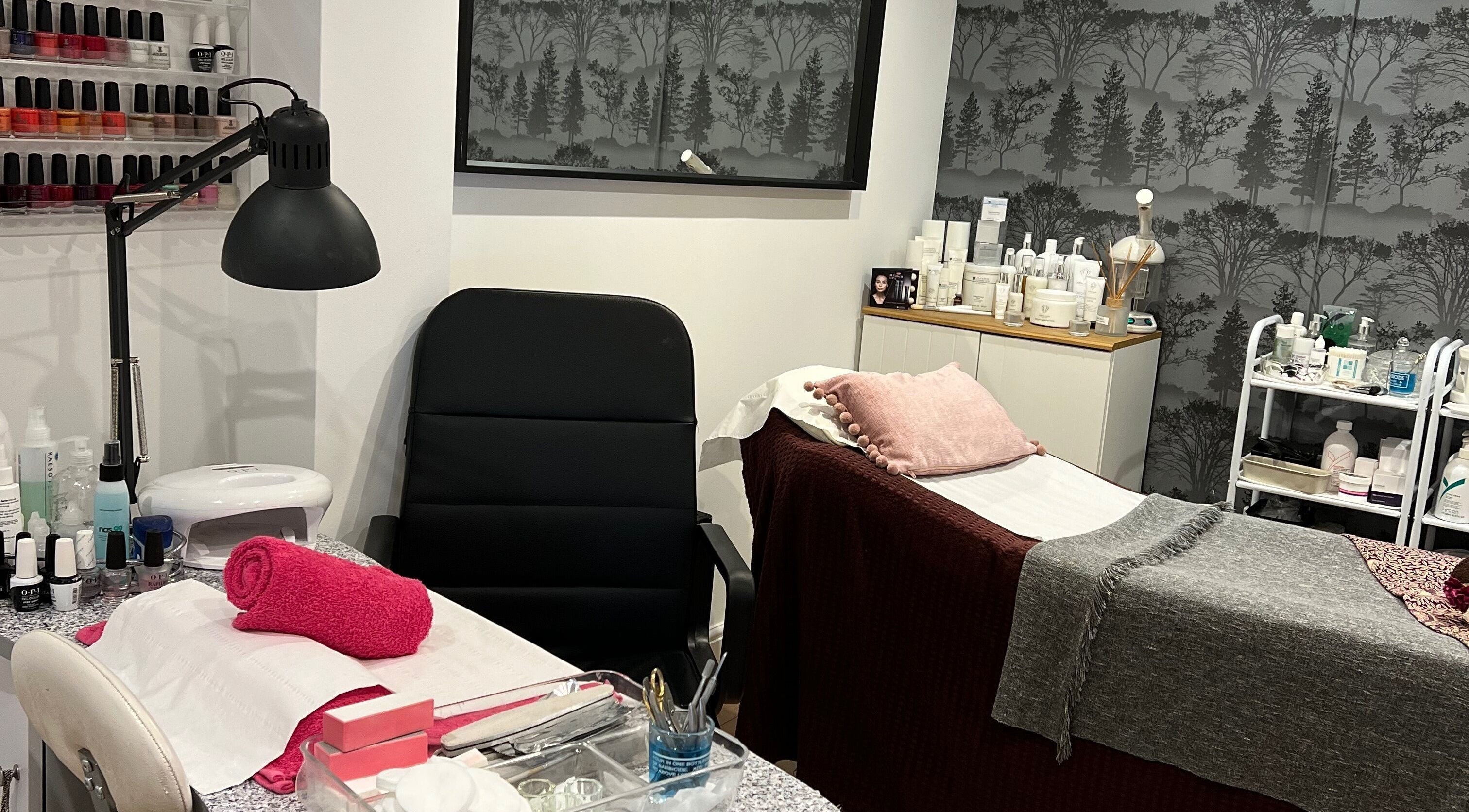 Relaxing treatment room at Archfit Beauty by Rabia Ehsan, Birmingham, England, GB, featuring elegant decor.