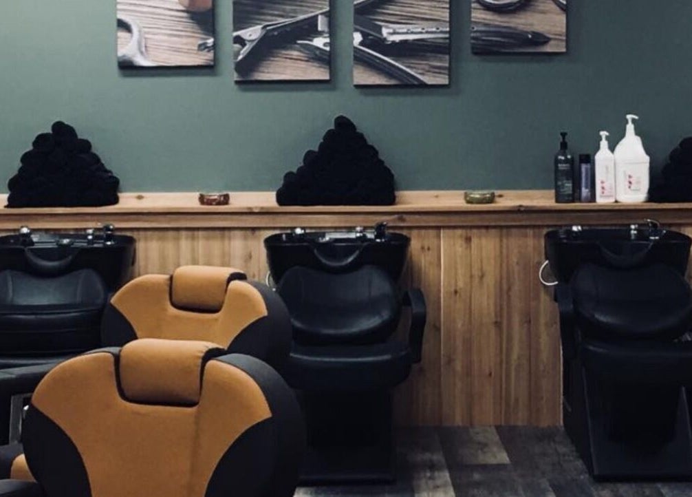 Modern salon chairs and wash stations at Studio 815, Genoa, Illinois, US.
