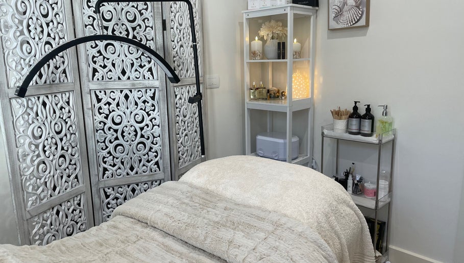 Relaxing treatment room at Saoirse Skin and Beauty, Melbourne, Victoria, AU with elegant decor and soothing lighting.