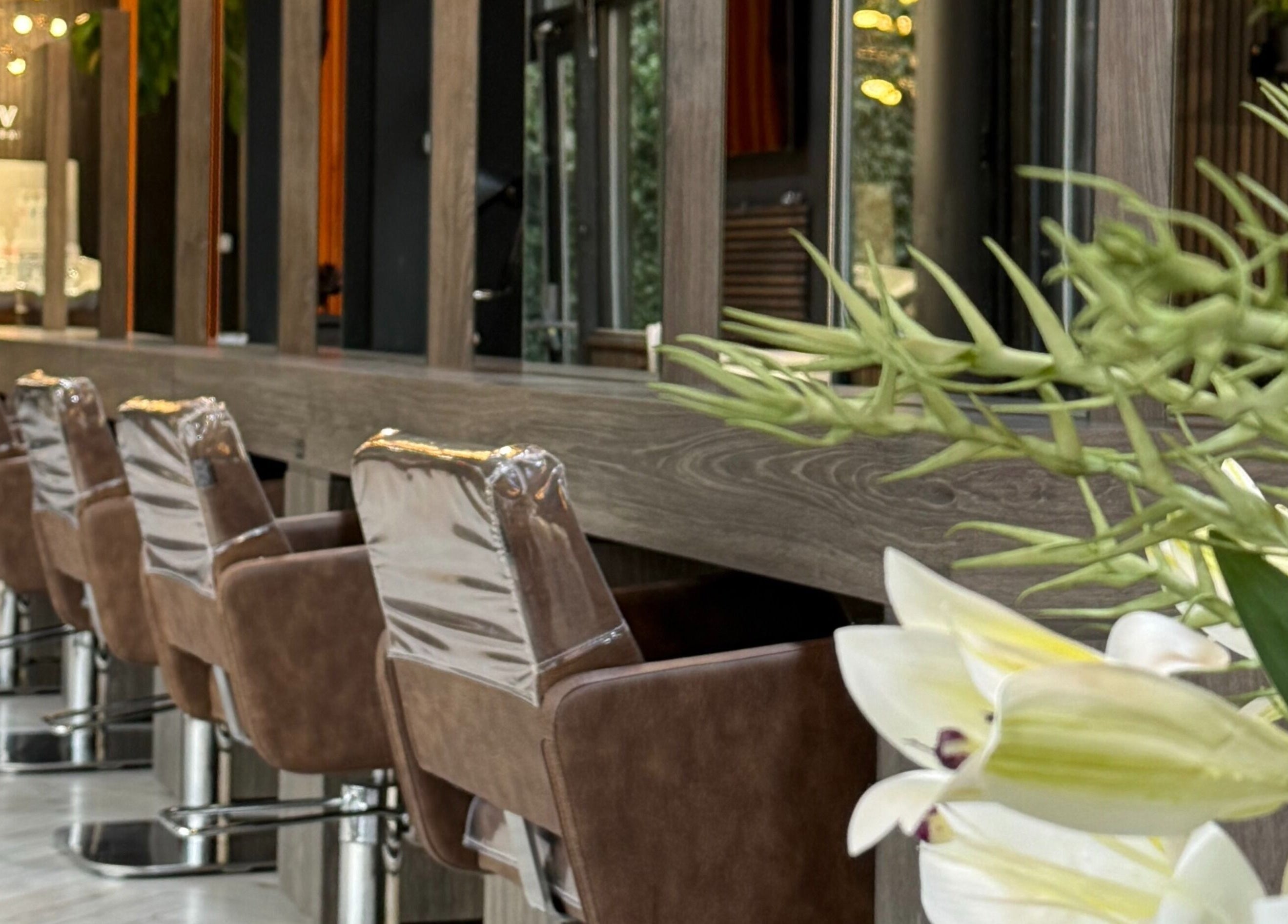 Stylish seating at Elite Hair Extensions, Dublin, County Dublin, IE highlighting the salon's luxurious ambiance.