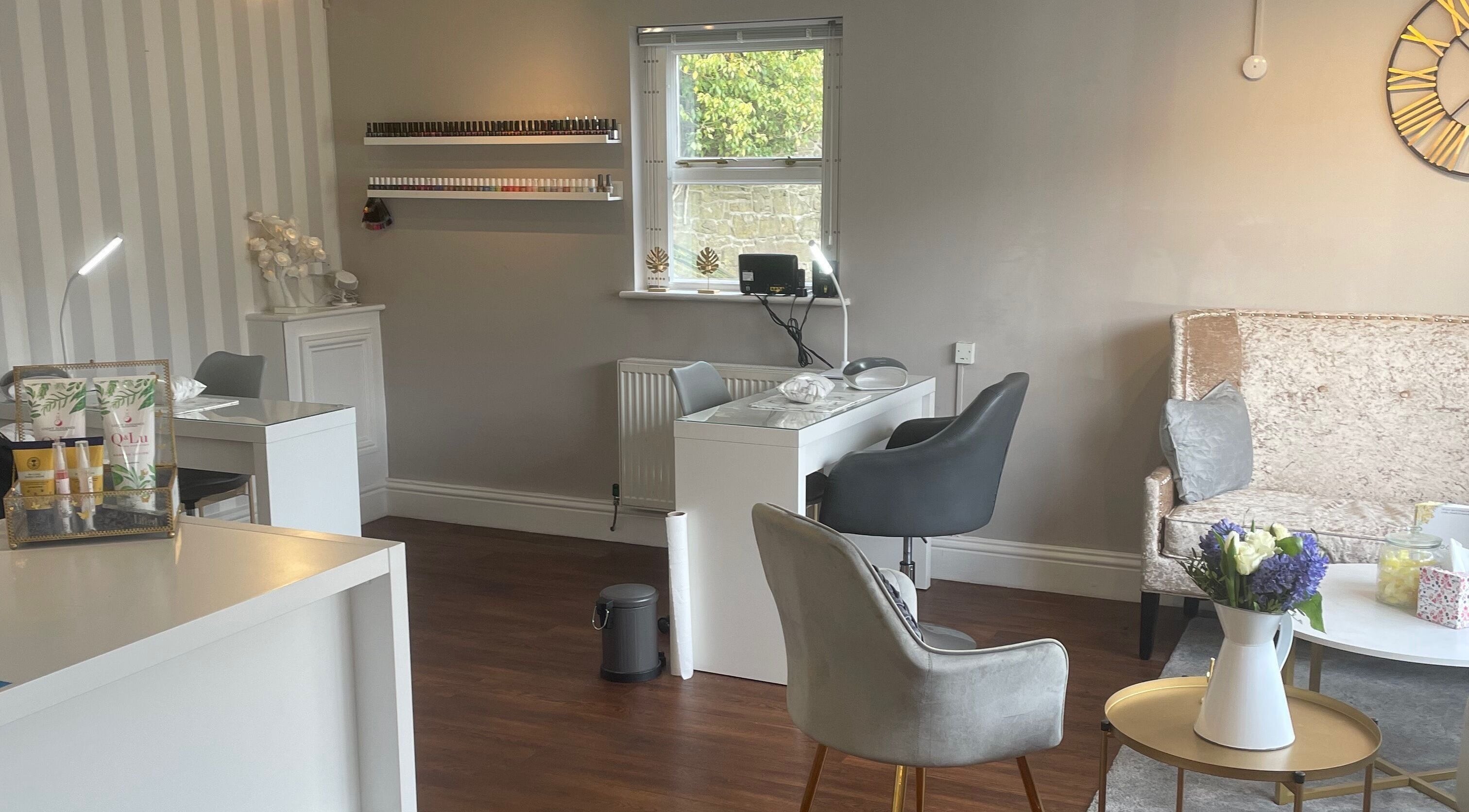 Chic interior of Soothe Day Spa in Whaley Bridge, England, featuring plush seating and serene decor.