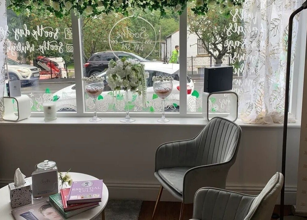 Cozy interior of Soothe Day Spa in Whaley Bridge, England, GB with elegant decor and greenery.