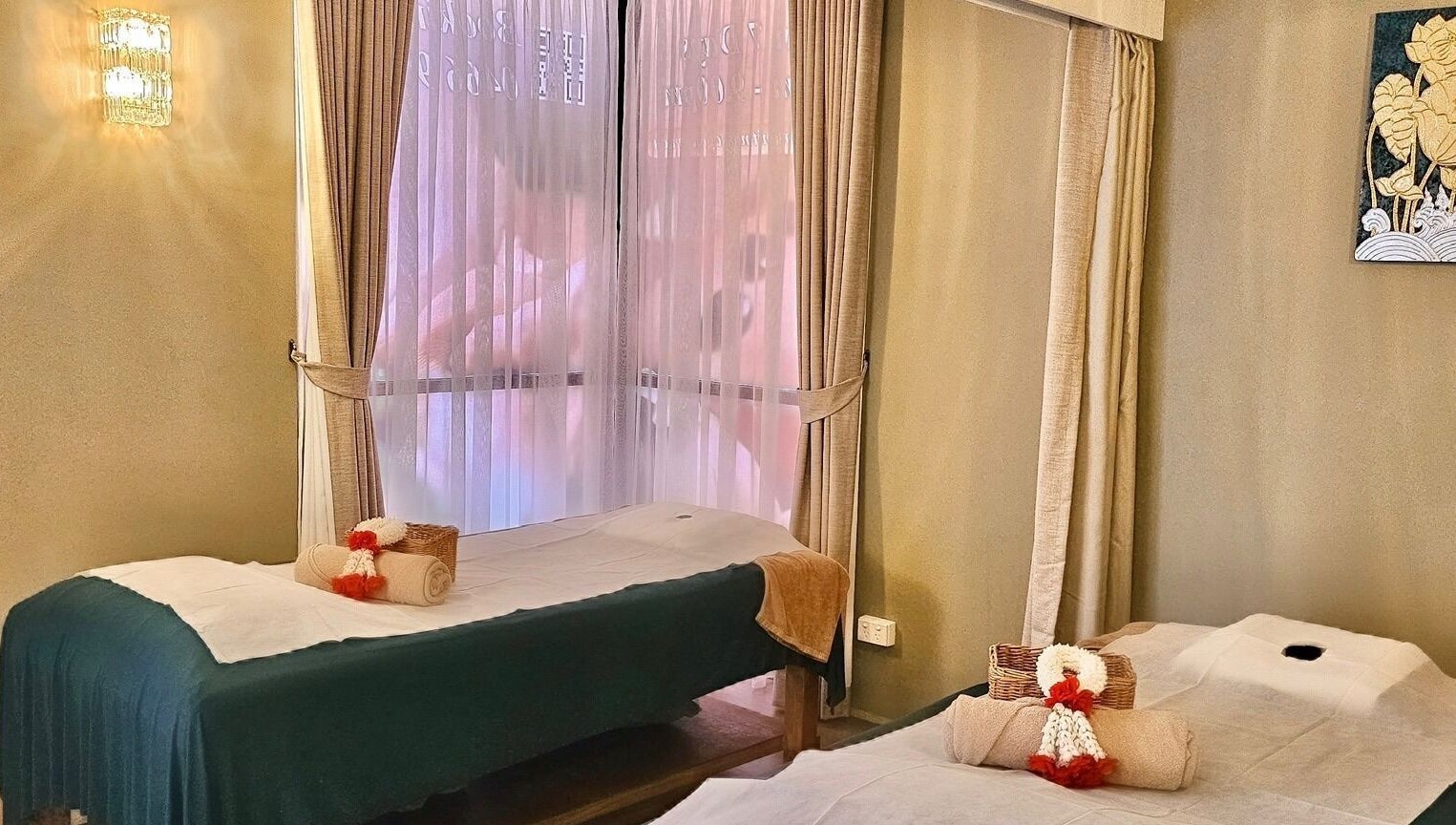 Massage room at Vaughan St. Branch - Thai Niramit Spa, Lidcombe, NSW, AU, featuring serene decor and treatment tables.