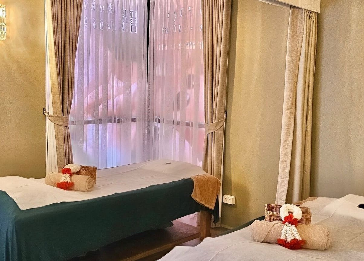 Massage room at Vaughan St. Branch - Thai Niramit Spa, Lidcombe, NSW, AU, featuring serene decor and treatment tables.