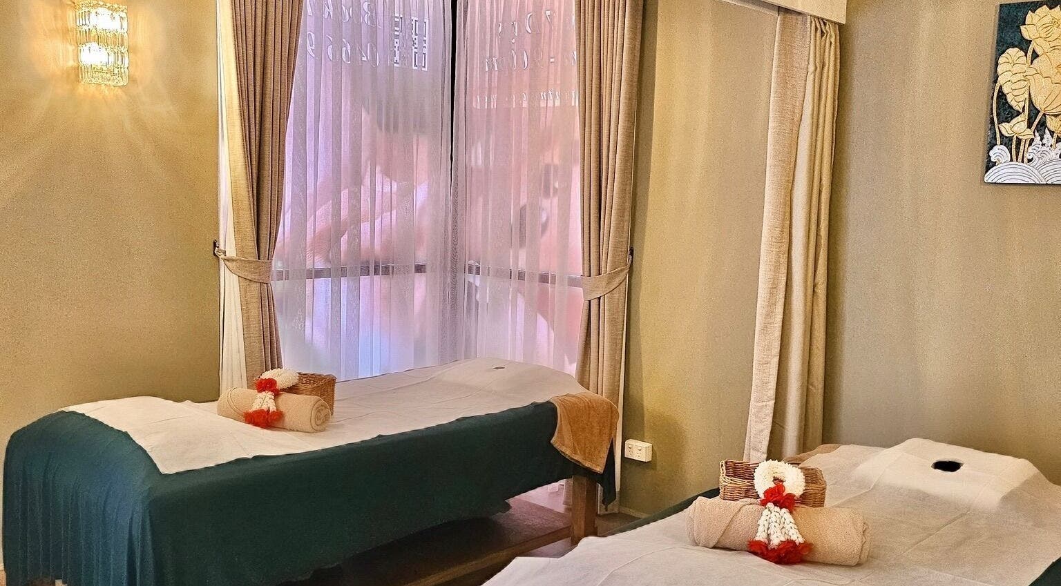 Massage room at Vaughan St. Branch - Thai Niramit Spa, Lidcombe, NSW, AU, featuring serene decor and treatment tables.