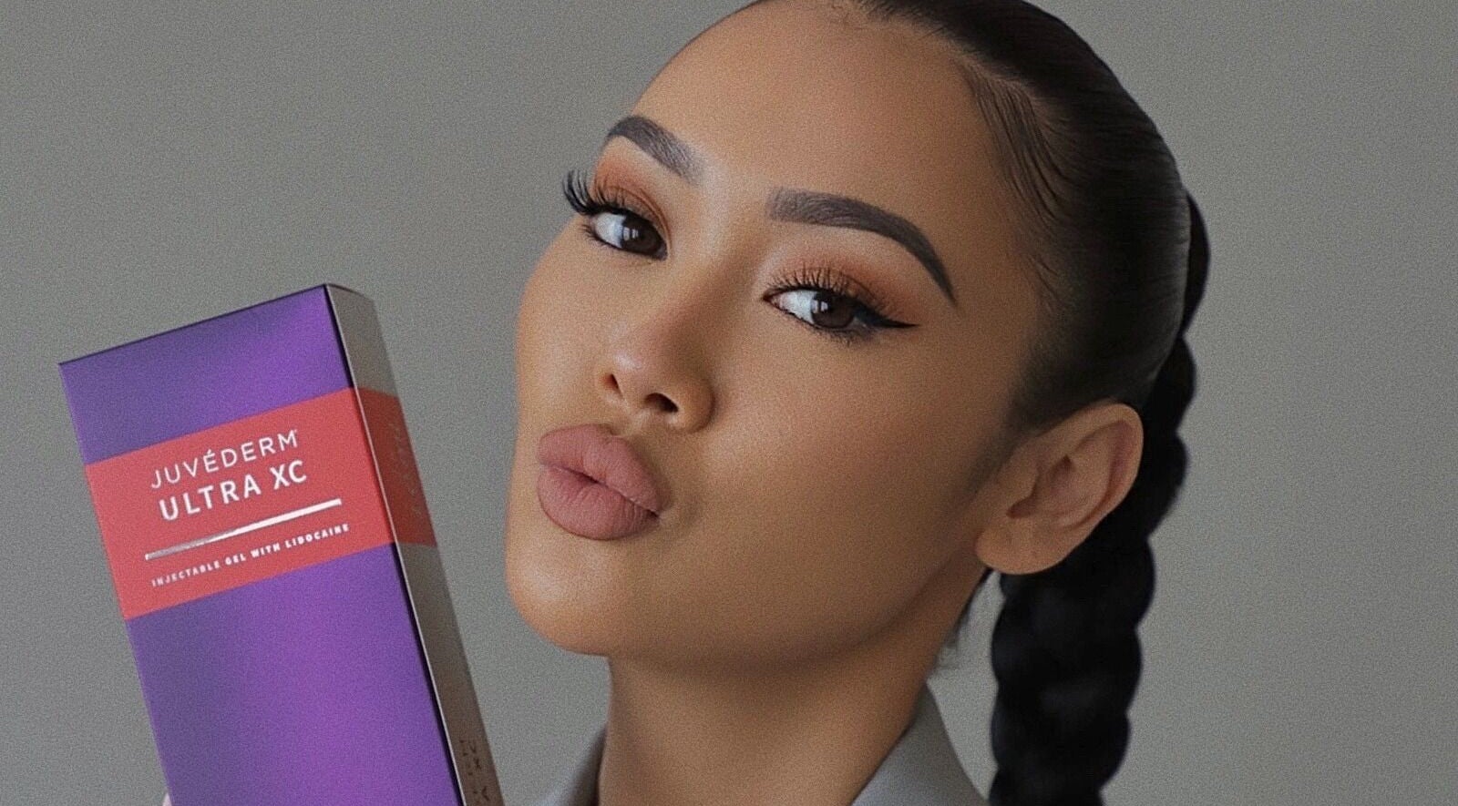 Woman showcasing Juvederm product at Derma Noor Medical Spa, Garden Grove, California, US