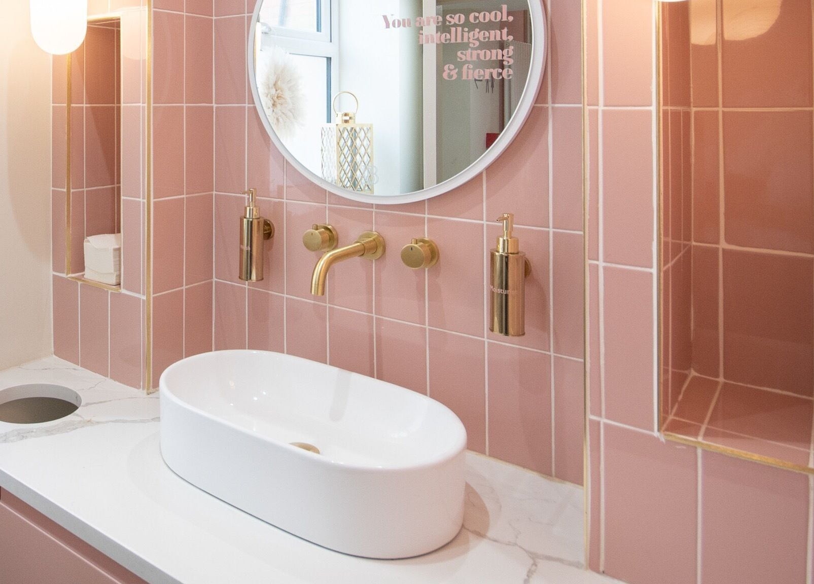 Elegant pink and gold bathroom vanity at Beautification Nottingham, Nottingham, England, GB.