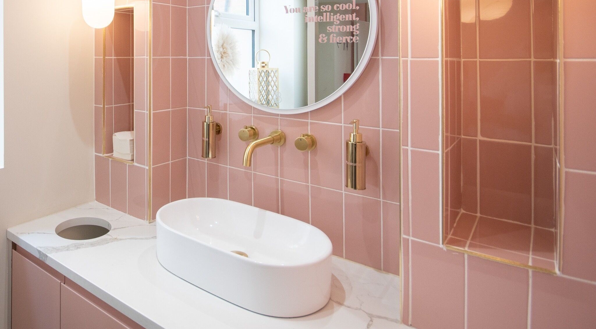 Elegant pink and gold bathroom vanity at Beautification Nottingham, Nottingham, England, GB.