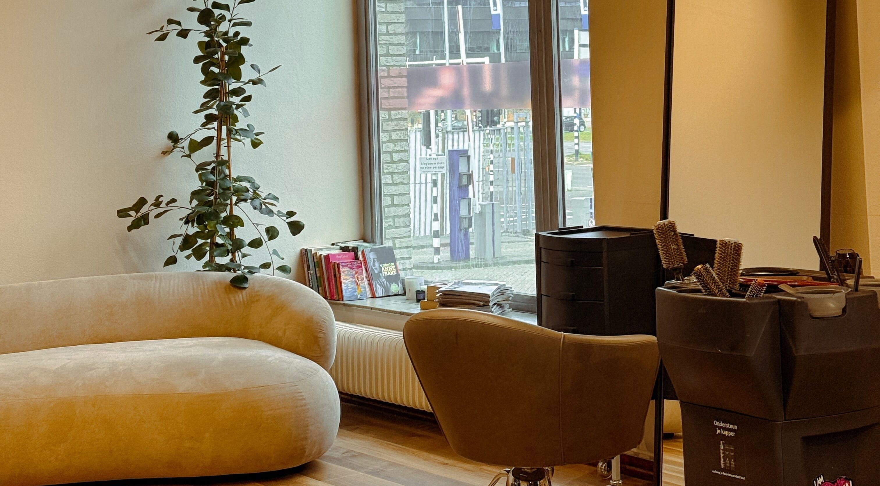 Elegant salon seating and styling area at Eliana Martt, Eindhoven, Noord-brabant, NL.