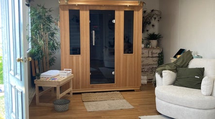 Cozy sauna room at Altruistic Alternative Therapies, Muckatah, Victoria, AU, featuring comfy seating and plants.