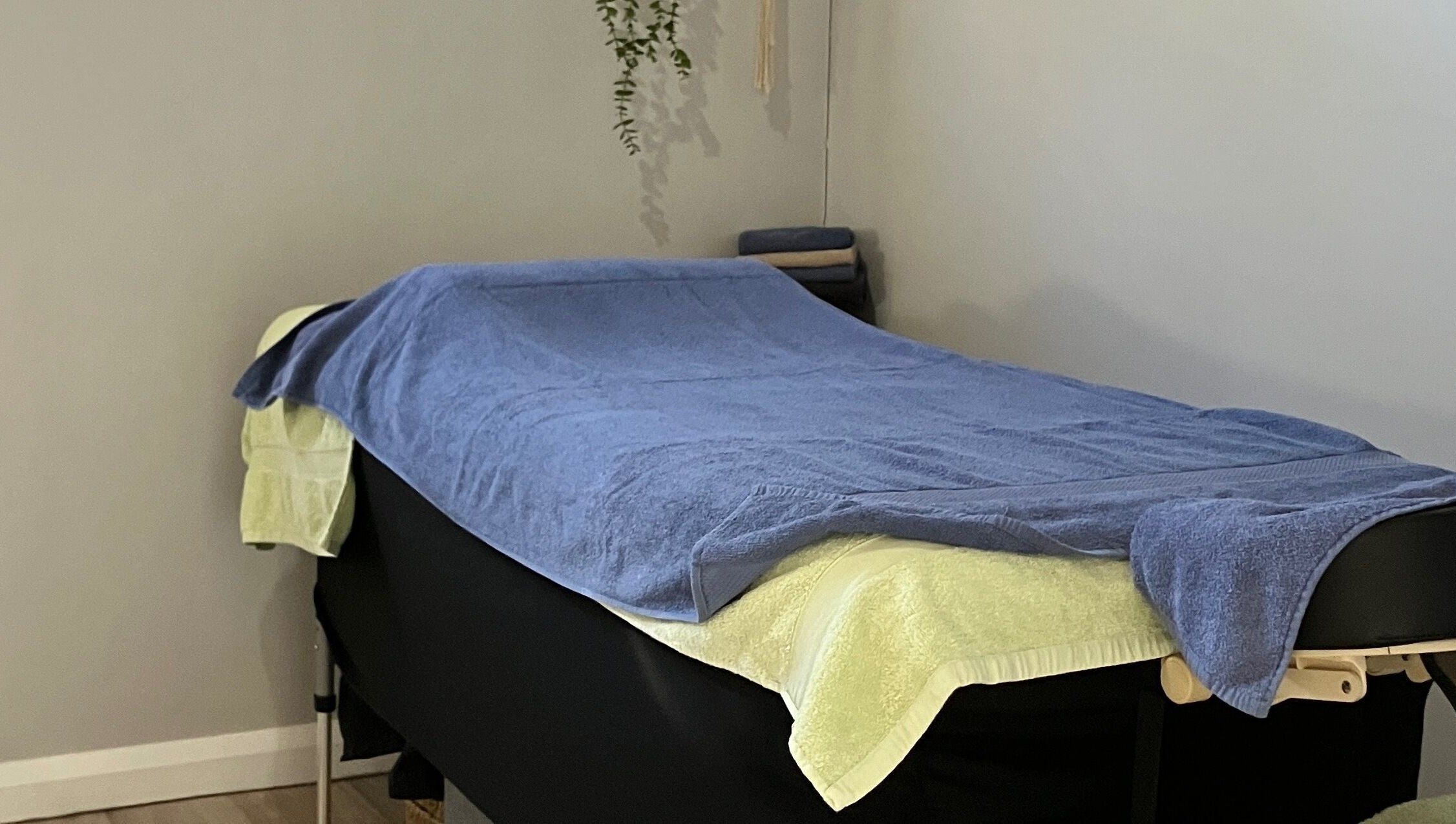 Massage table in Altruistic Alternative Therapies, Muckatah, Victoria, AU, with soft towels.
