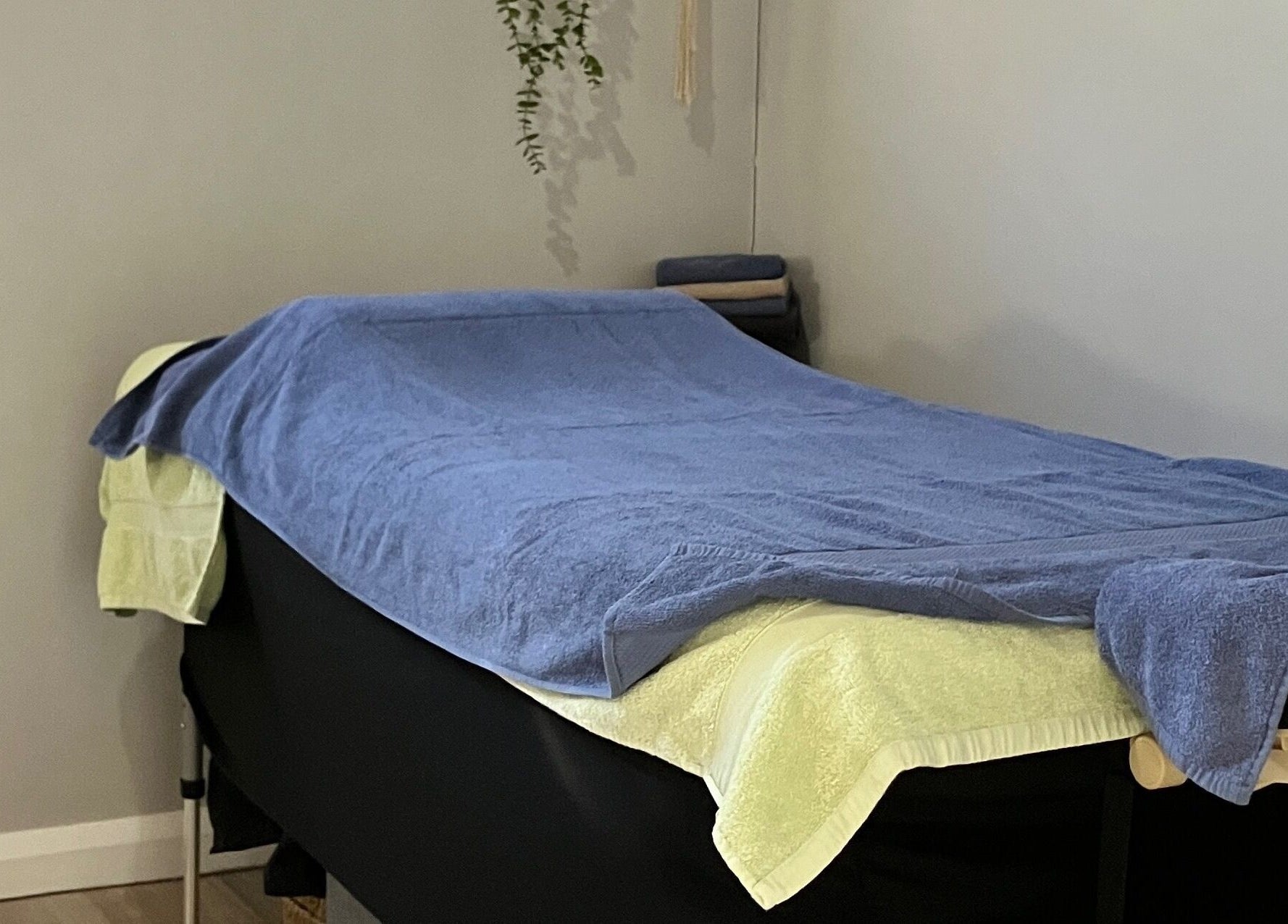 Massage table in Altruistic Alternative Therapies, Muckatah, Victoria, AU, with soft towels.