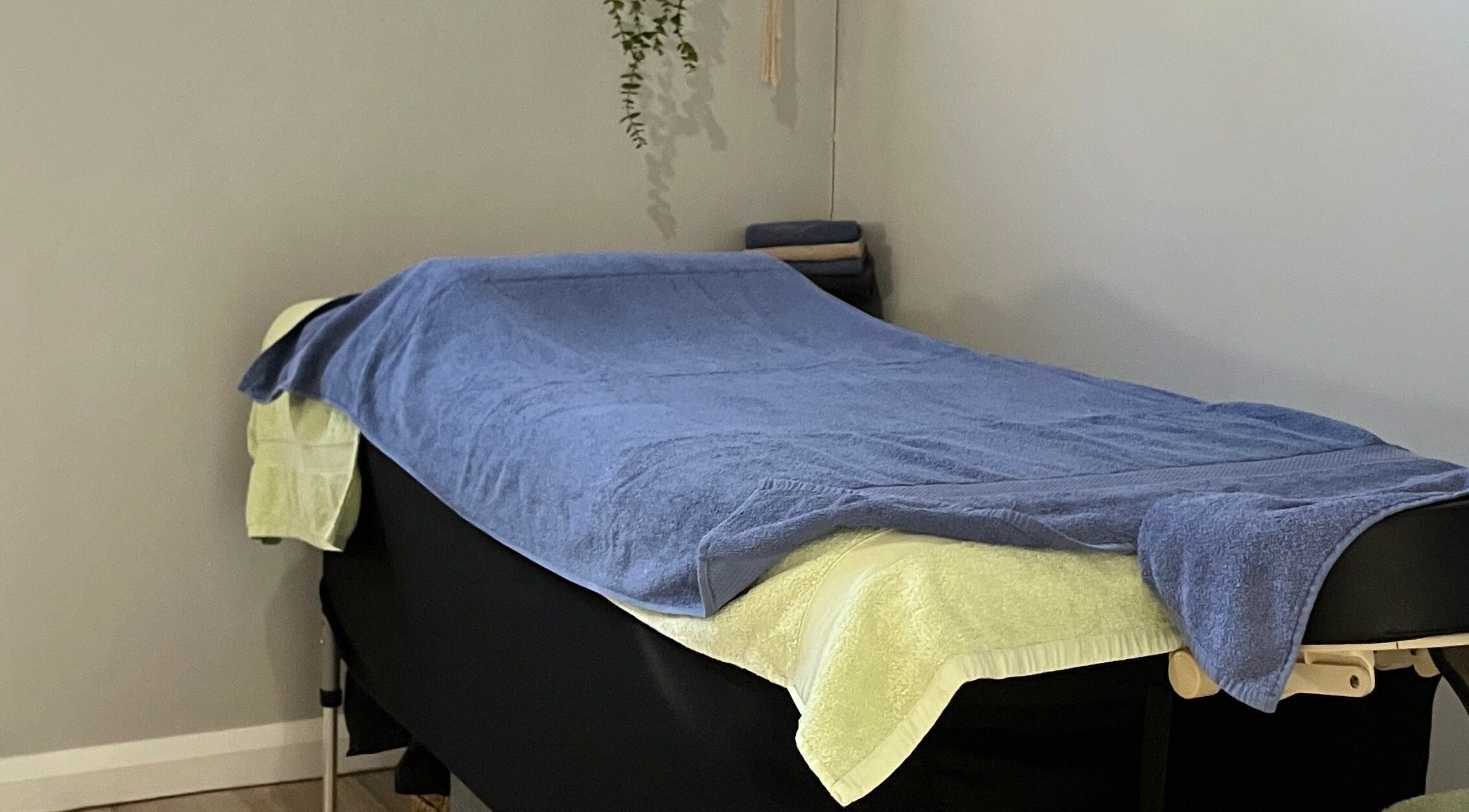 Massage table in Altruistic Alternative Therapies, Muckatah, Victoria, AU, with soft towels.