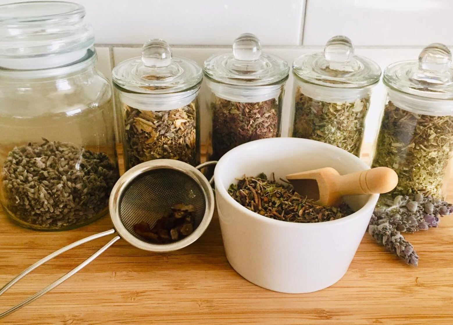 Glass jars with dried herbs at Altruistic Alternative Therapies, Muckatah, Victoria, AU.