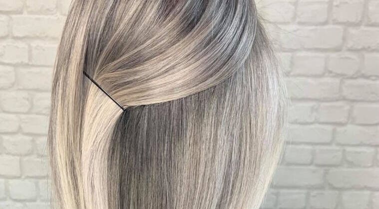 Elegant layered hairstyle at Amber Elizabeth Hairdressing, Greenock, Scotland, GB.