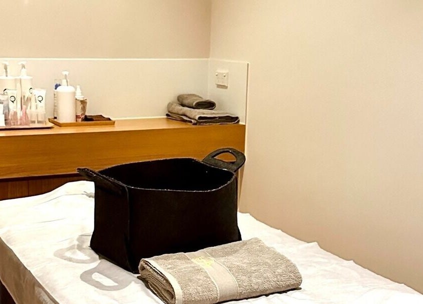Serene treatment room at Five Elements Spa, South Melbourne, Victoria, AU, featuring a massage table.