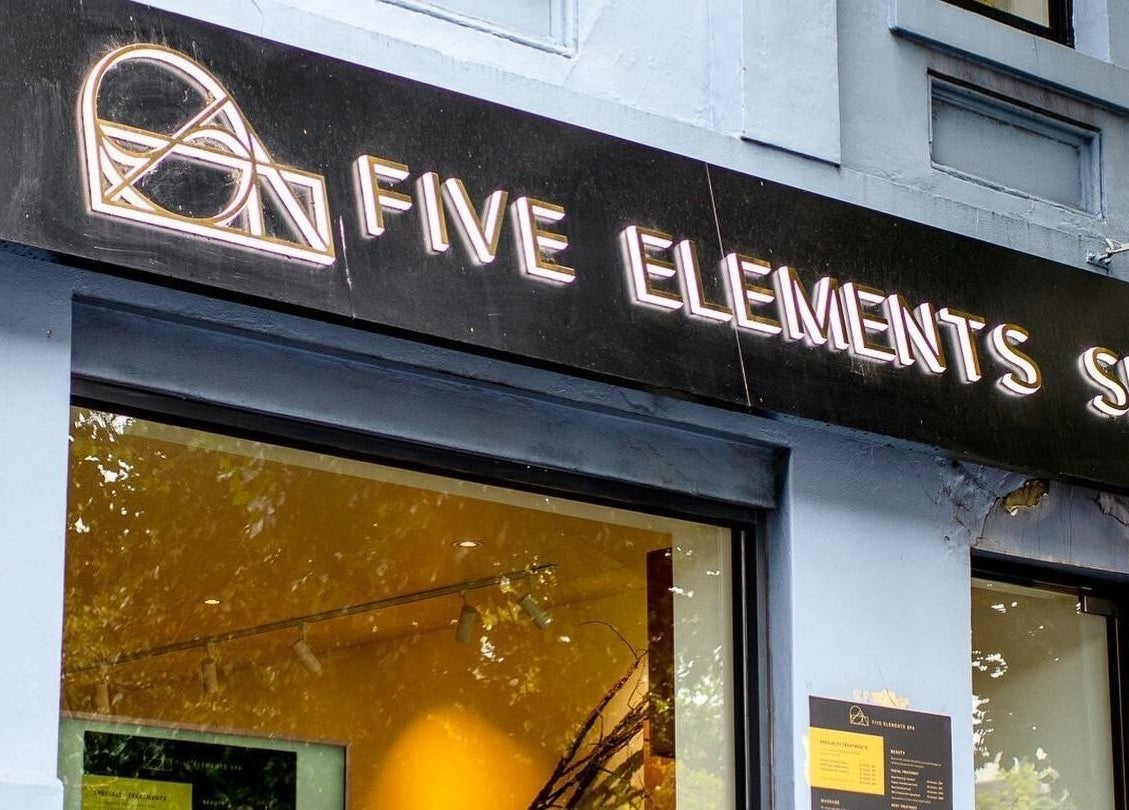 Entrance of Five Elements Spa with illuminated sign, South Melbourne, Victoria, AU.