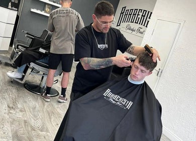 Barberista stylist perfects a haircut in Celbridge, County Kildare, IE barbershop.
