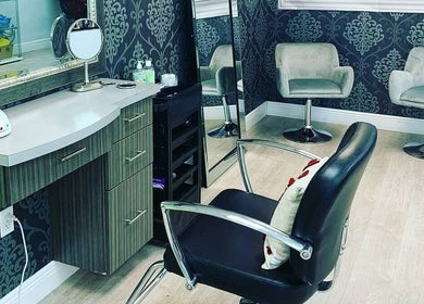 Chic interior of Liquid Glamour Nails Salon in Miami, Florida, US, showcasing modern beauty chairs and decor.